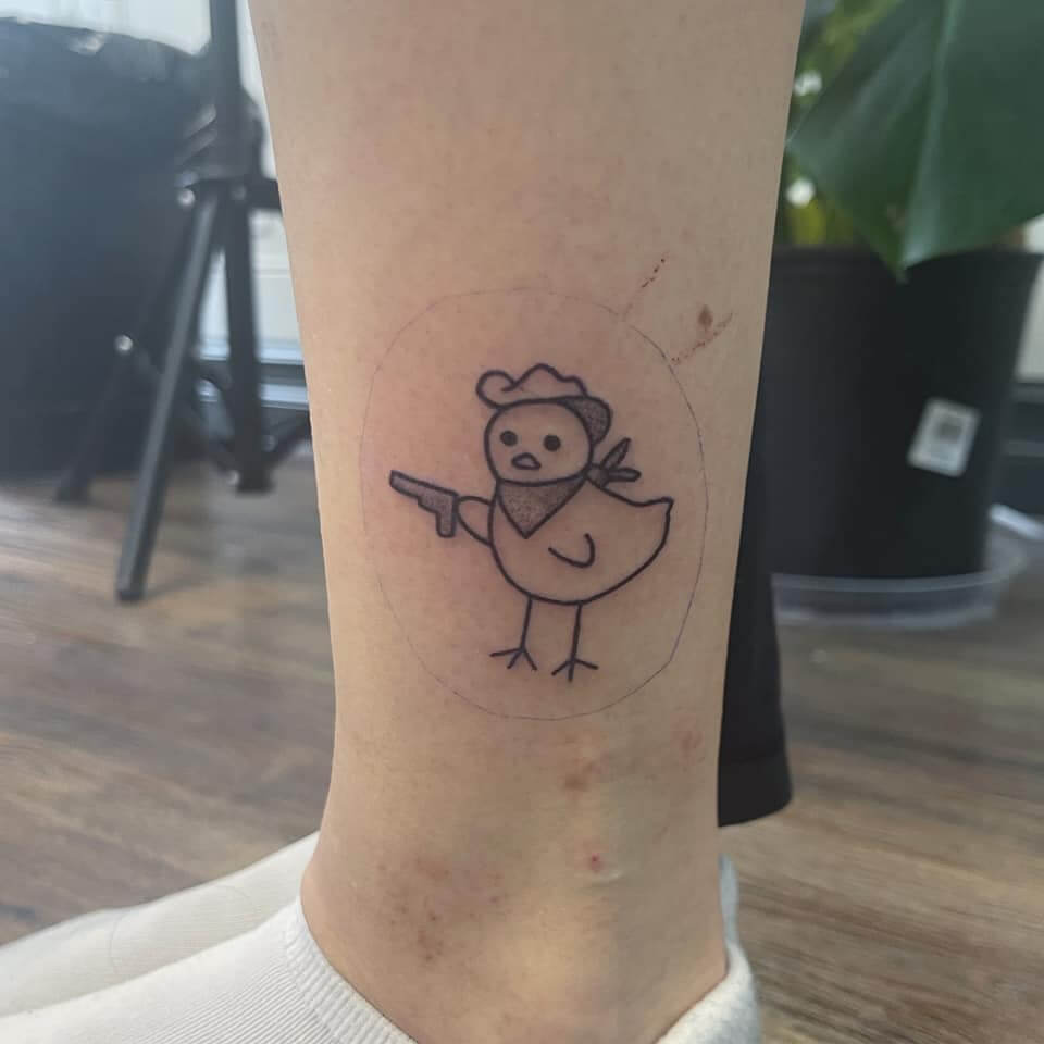 Chicken Tattoo on Left Leg Above Ankle