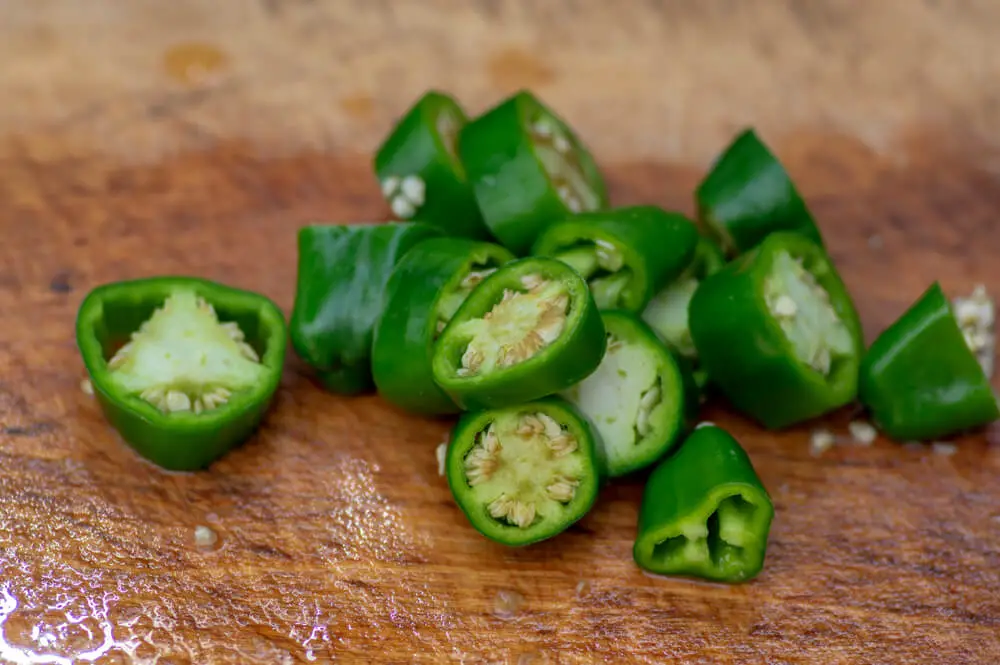 Chickens love eating jalapenos! Not only are they delicious for your chickens, but these peppers can also help provide some extra entertainment value for you.