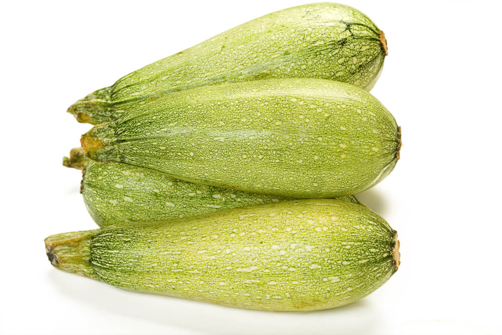 The zucchini of the Magda variety are easily identifiable by their characteristic light green hue